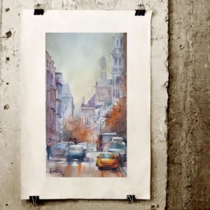 Şehir caddesinde arabalar, sonbahar ağaçları ve arka planda katedral kulesi betimlenen Aynur Akalın imzalı orijinal suluboya tablo.